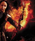 Jennifer Lawrence como Katniss em Jogos Vorazes: Em Chamas