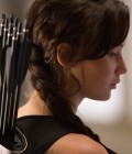 Jennifer Lawrence como Katniss em Jogos Vorazes: Em Chamas