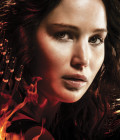 Jennifer Lawrence como Katniss em Jogos Vorazes: Em Chamas